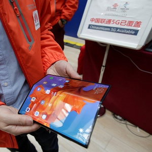 全国两会新闻中心首次“牵手”5G 引外媒热议