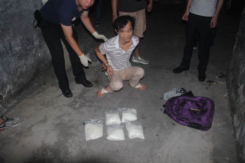 灵山警方联手广东警方破获一起特大贩毒案 缴毒4.9公斤