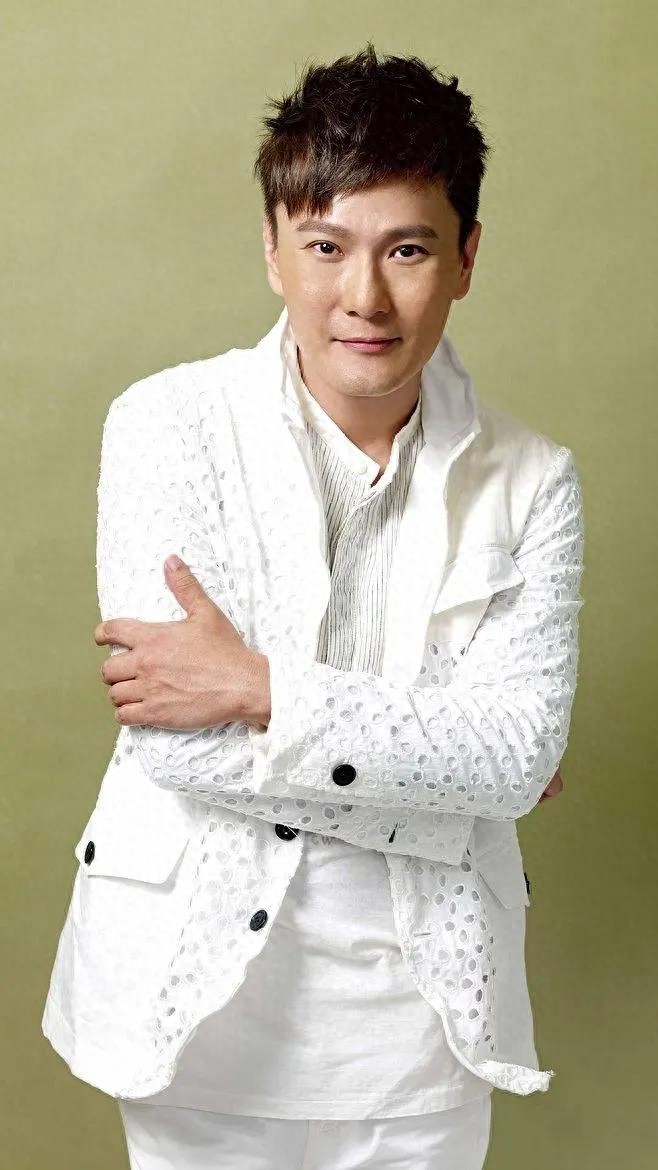 张信哲的歌，你最喜欢哪一首？一首《过火》唱哭多少男人
